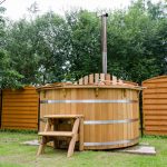 Hoe kun je meer wellness in huis halen? sauna in de tuin